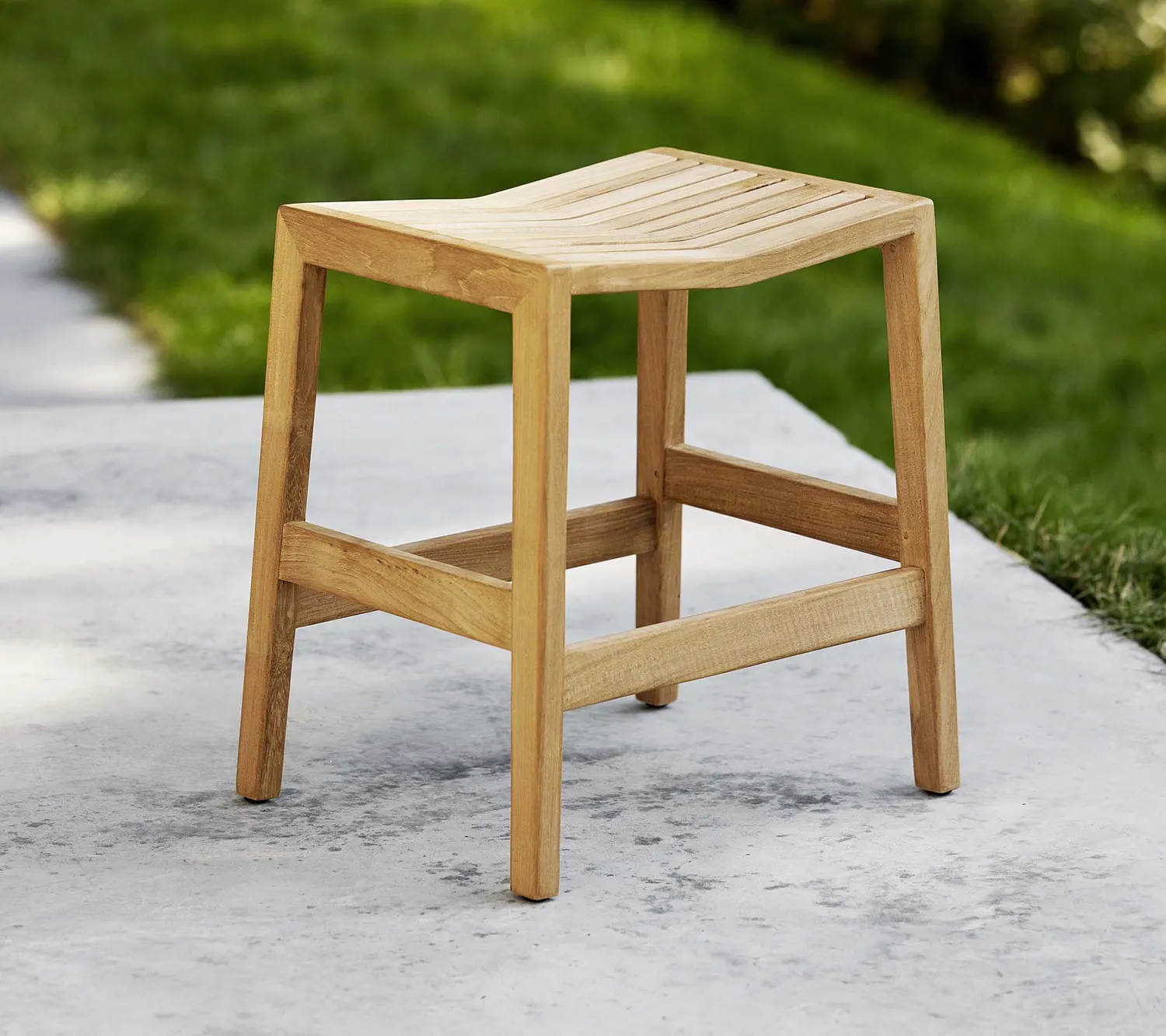 Cane-line Flip Fußhocker Teak stapelbar naturbelassen