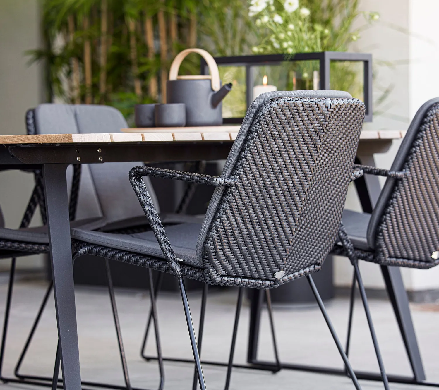 Cane-line Vision Armchair Armlehnstuhl Schwarz Graphit Weave stapelbar